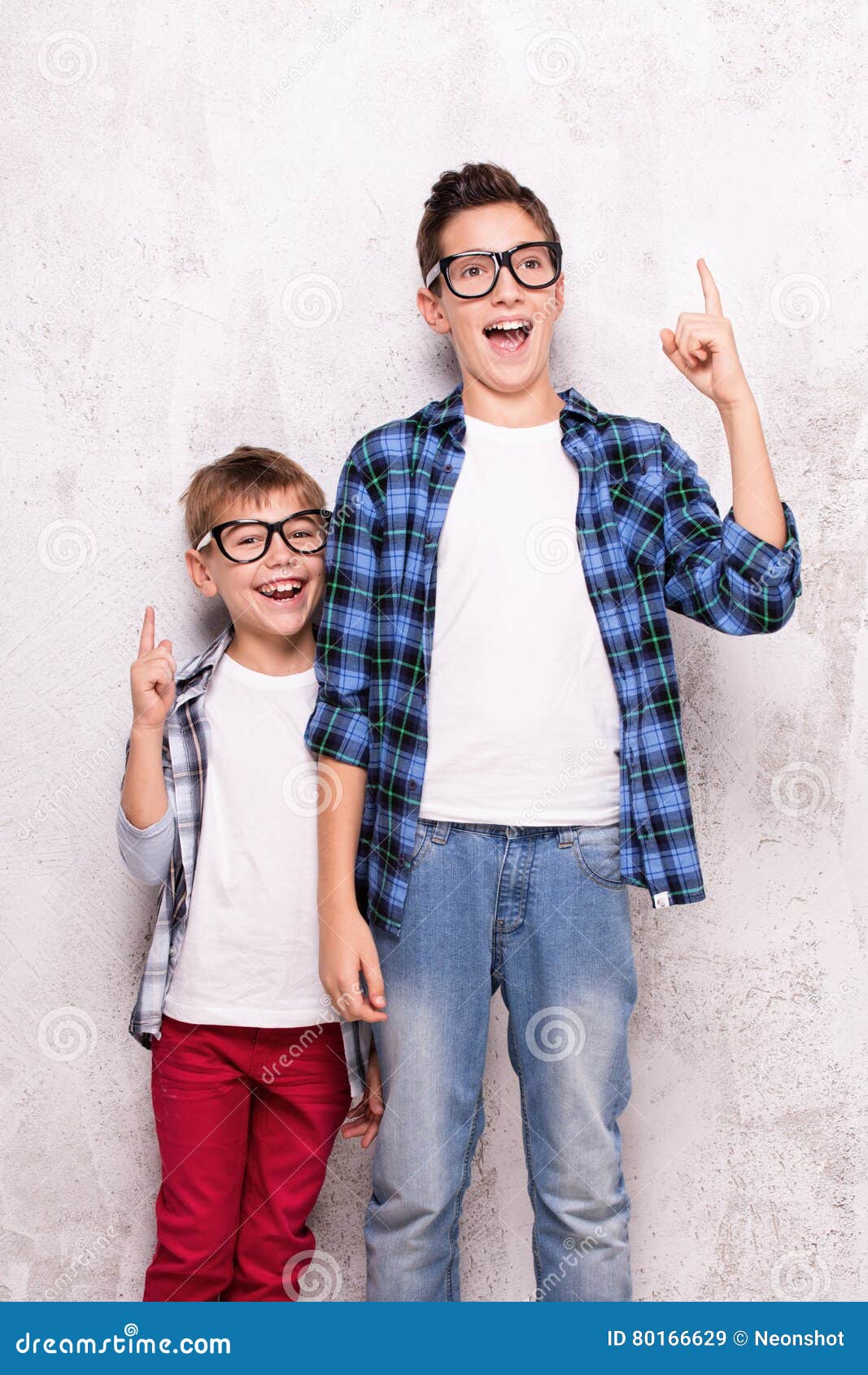 2 Brothers Posing for a Portrait on White Background Stock Photo - Alamy