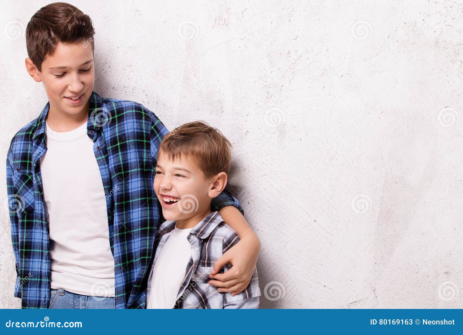 Two young brothers posing. stock image. Image of female 80169163