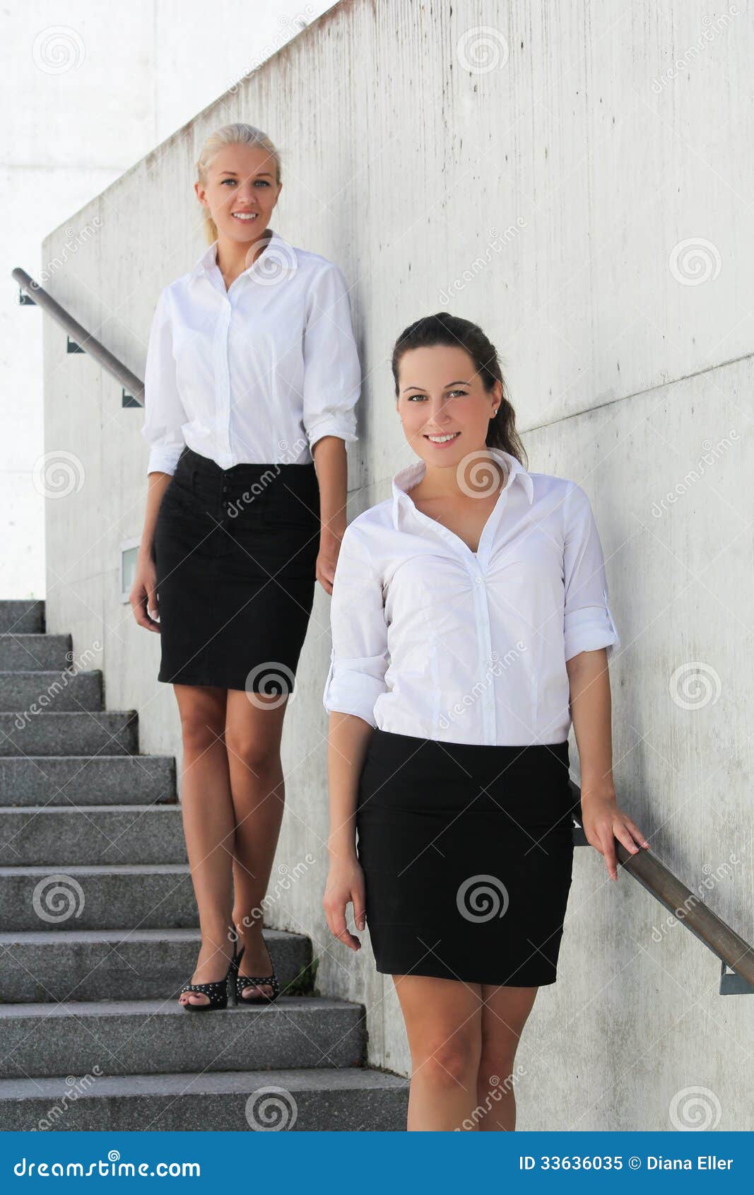 Two Young Business Women Posing on Stairs Stock Image - Image of ...