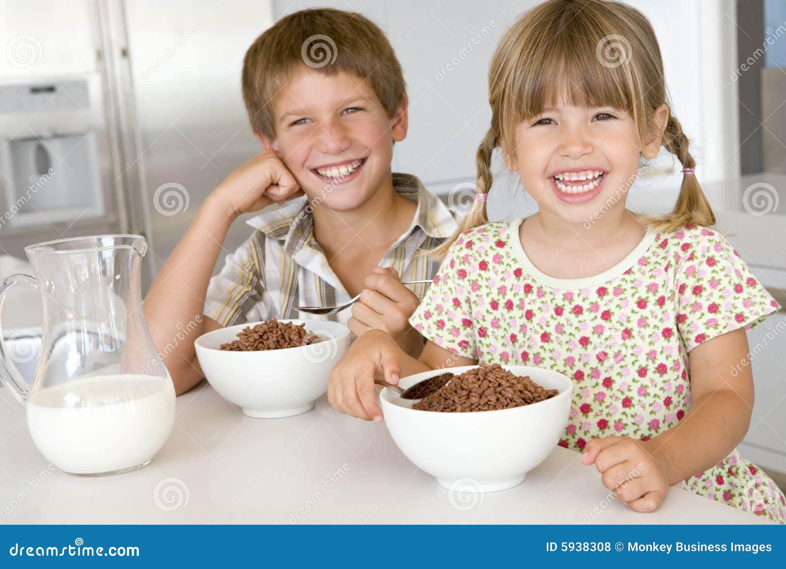 group of kids eating cereal
