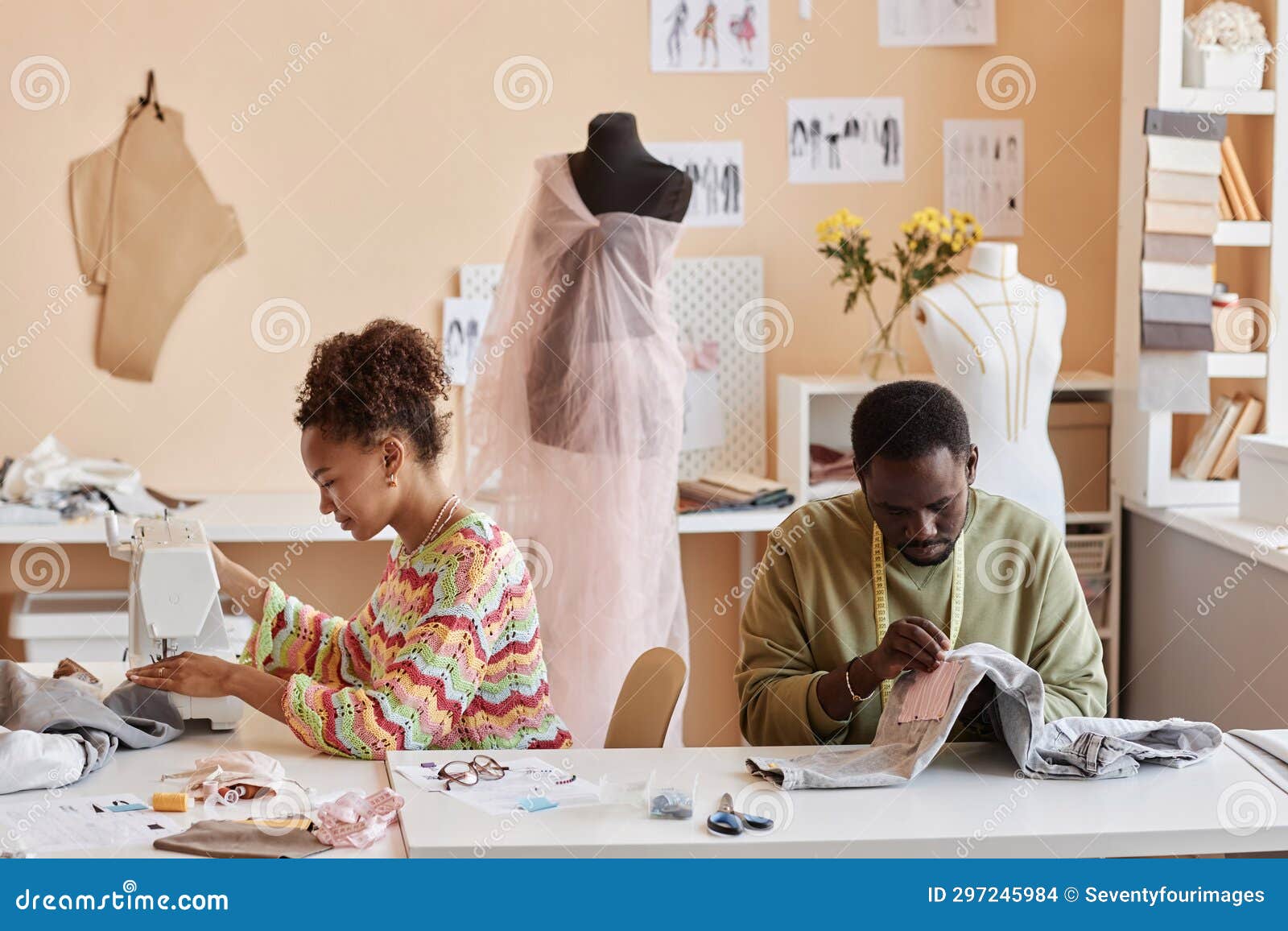 Two Young Creative African American Designers or Stylists Sewing New ...