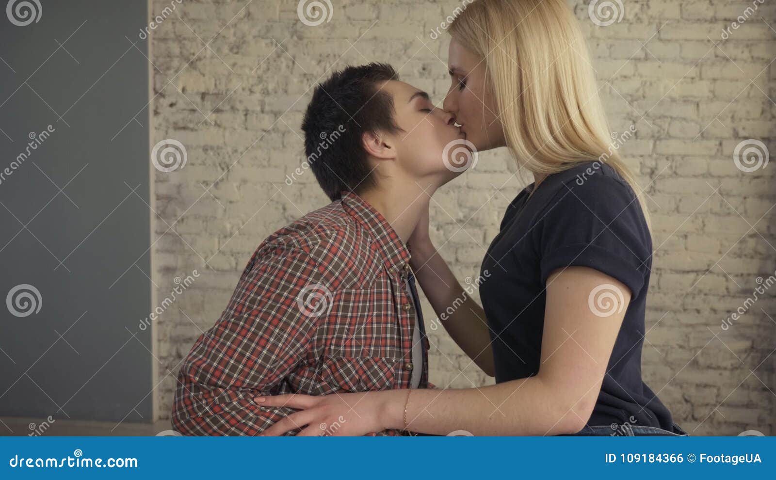 Two Young Cute Lesbian Girls Hugging and Passionately Kissing, Cute, Lovers, Lgbt, Girls, Love, Sex 60 Fps Stock Footage image photo