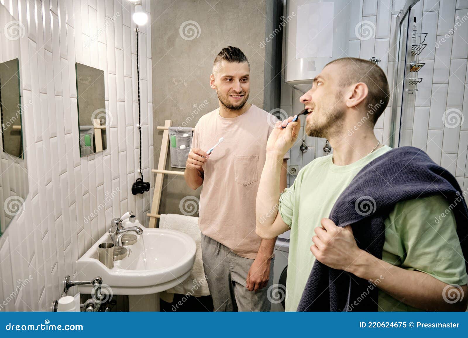 Two Young Gay Men Brushing Teeth in Bathroom Stock Image Image of