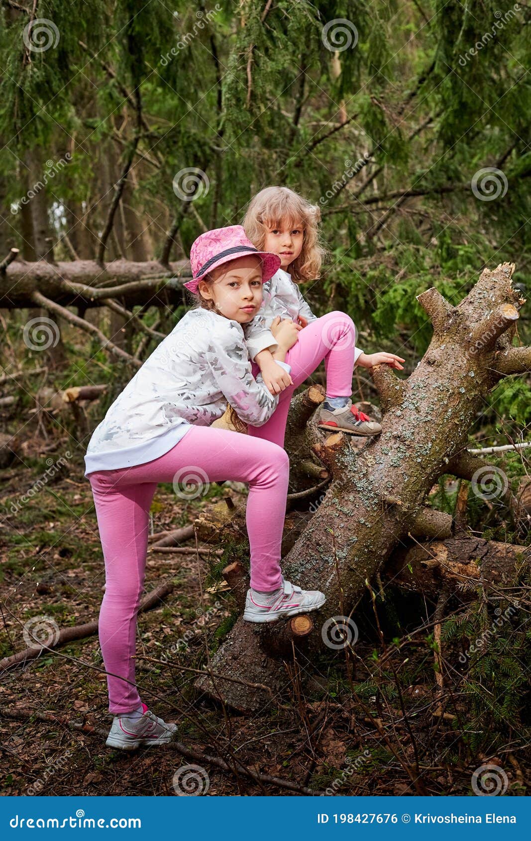 Two Young Girl Playing And Ha