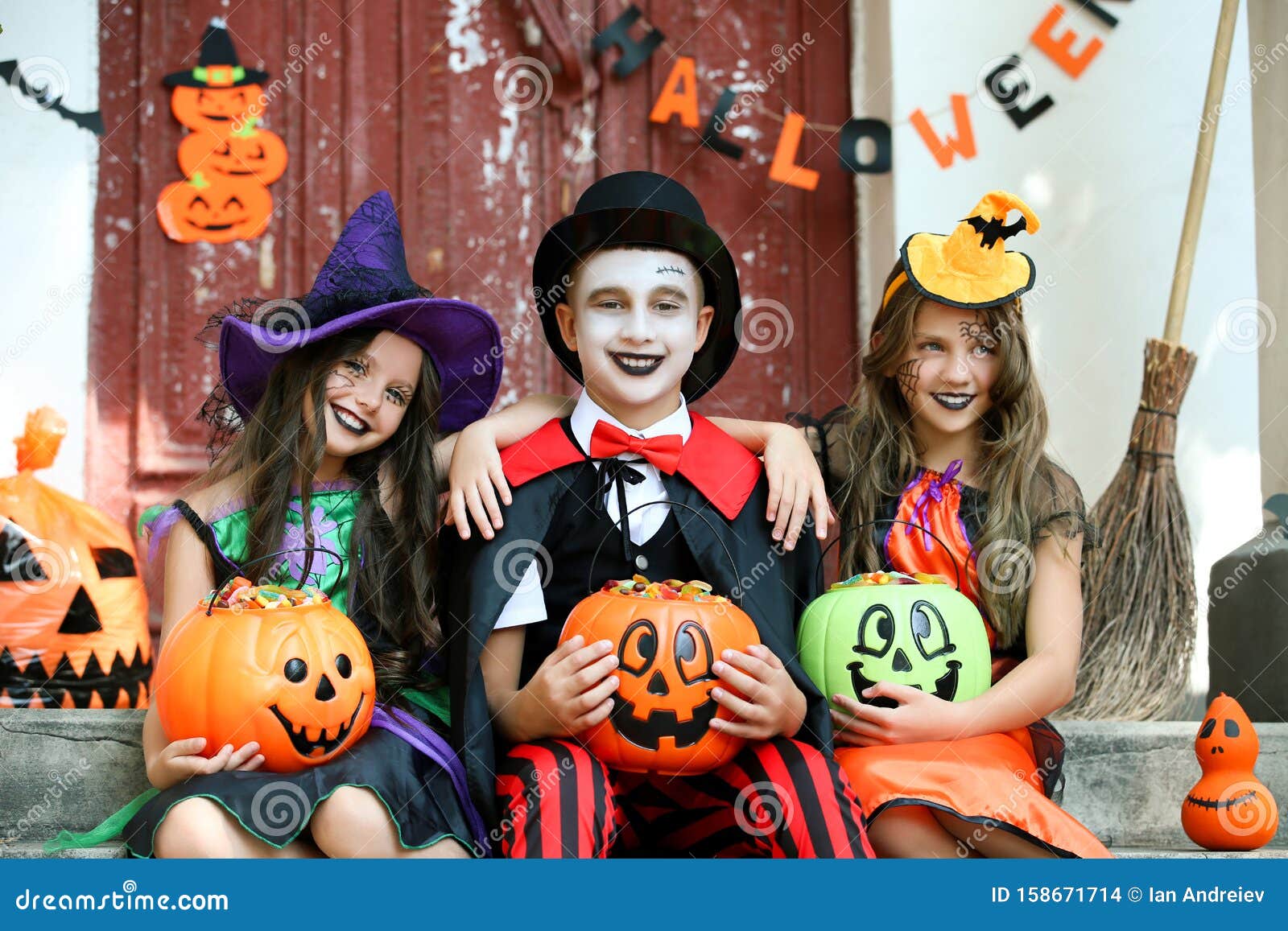 Young Girls and Boy in Halloween Costumes Stock Photo - Image of happy ...