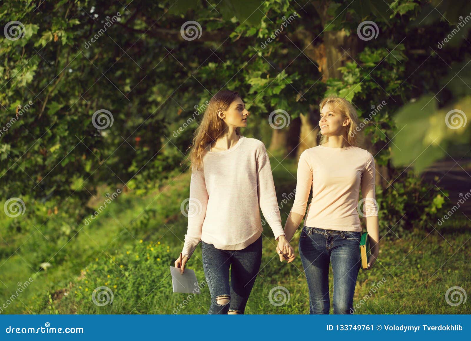 Two Young Girls Hold Hands Stock Image Image Of Girlfriends 133749761