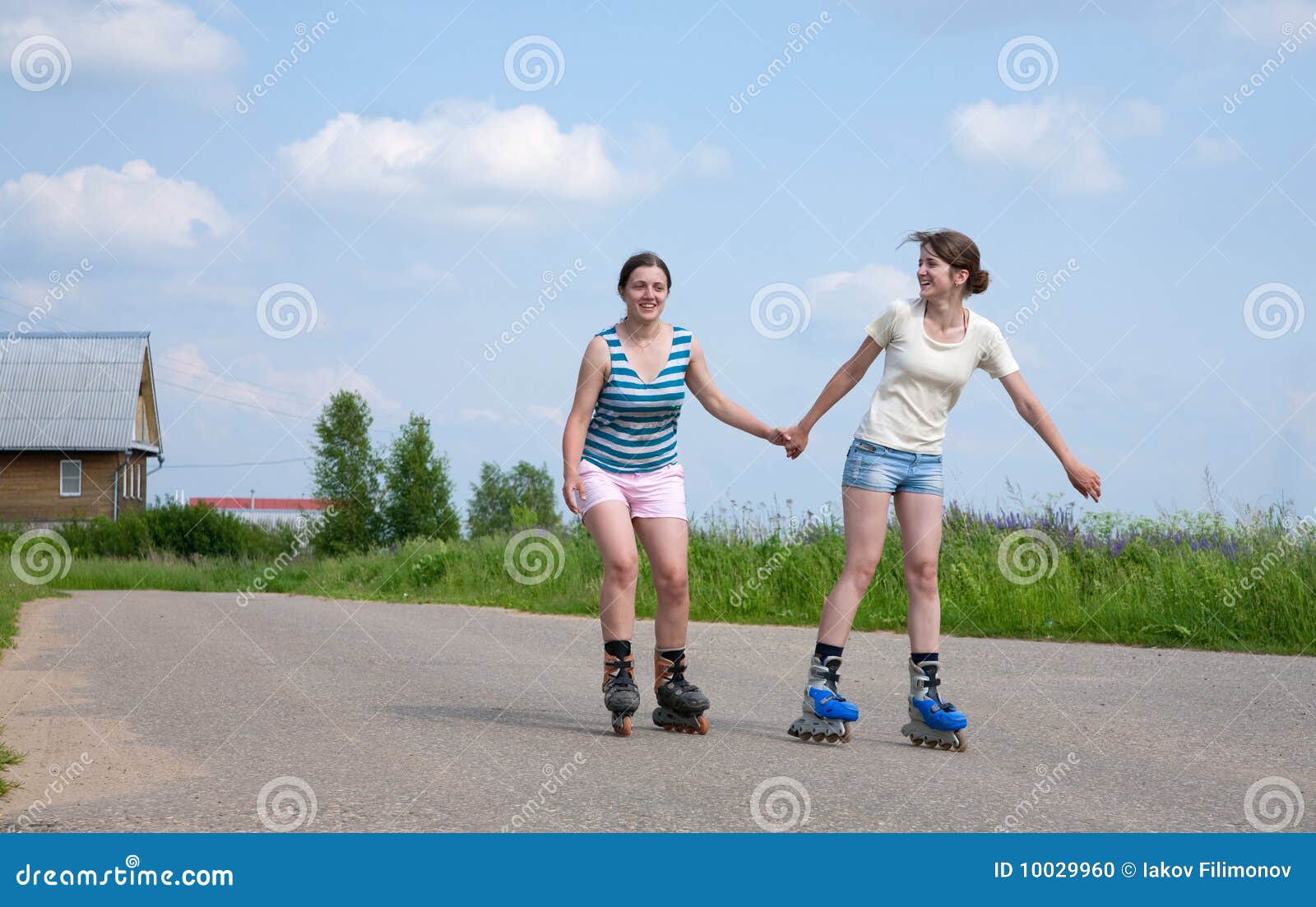 Two Young Girls on Roller Blades Stock Photo Image of healthy, speed