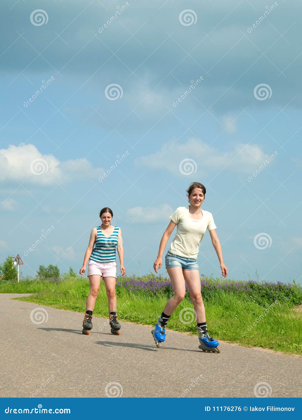 Two Young Girls on Roller Blades Stock Photo Image of girls, athlete