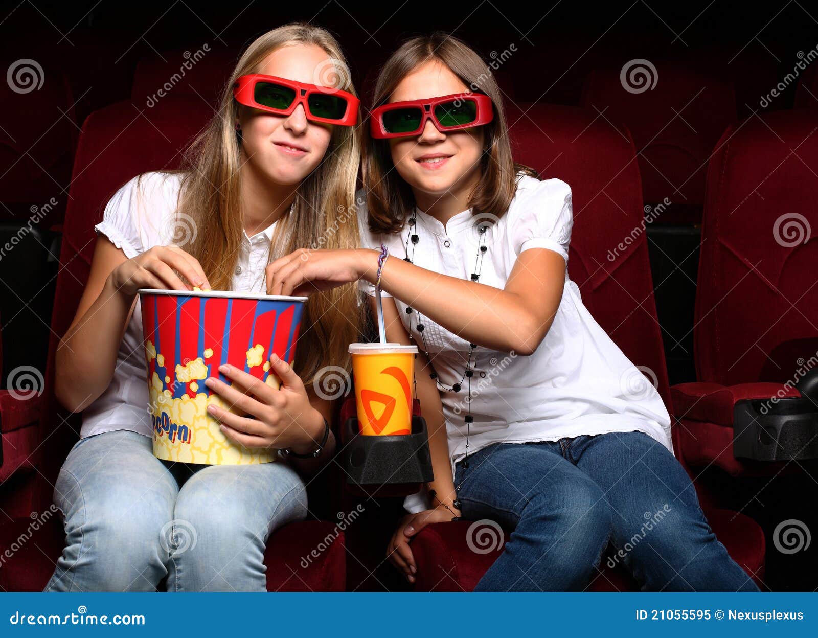 Two Young Girls Watching in Cinema Stock Image Image of glasses, film