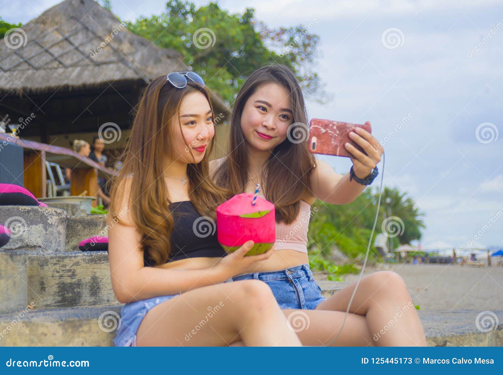 https://thumbs.dreamstime.com/z/two-young-happy-attractive-asian-chinese-korean-women-hanging-out-girlfriends-enjoying-holidays-trip-tropical-resort-125445173.jpg