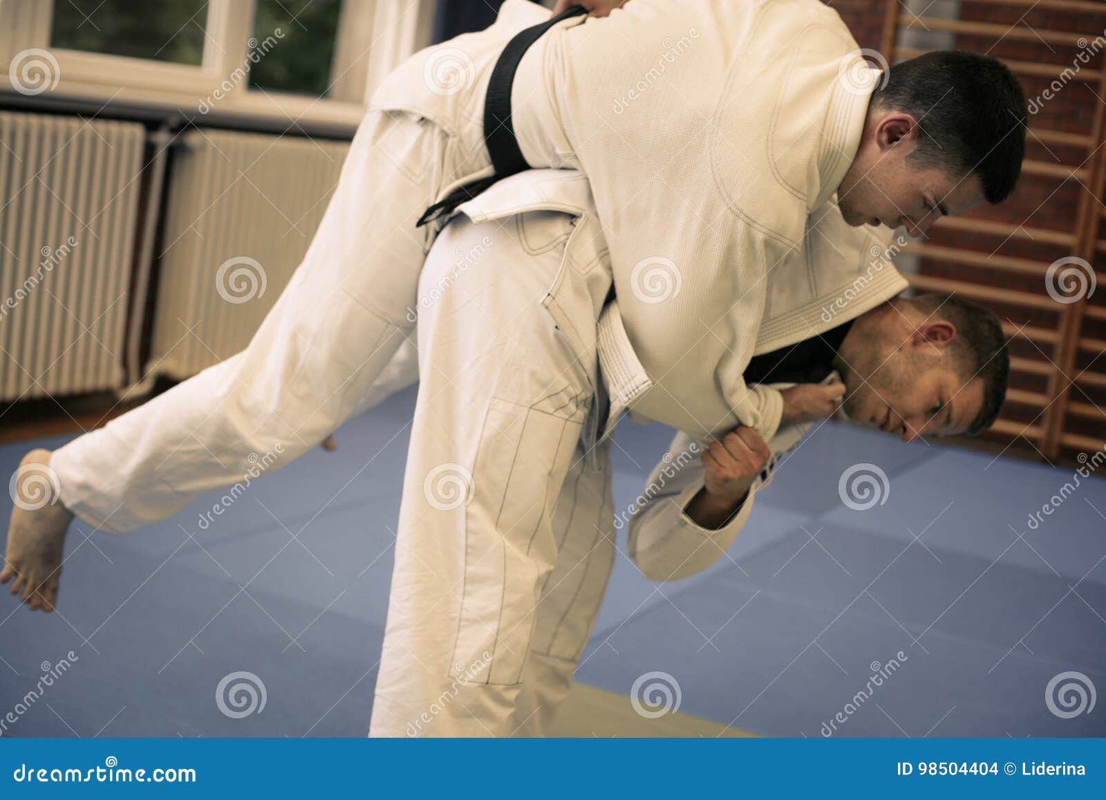 Two Young Males Practicing Judo Together. Stock Photo Image of