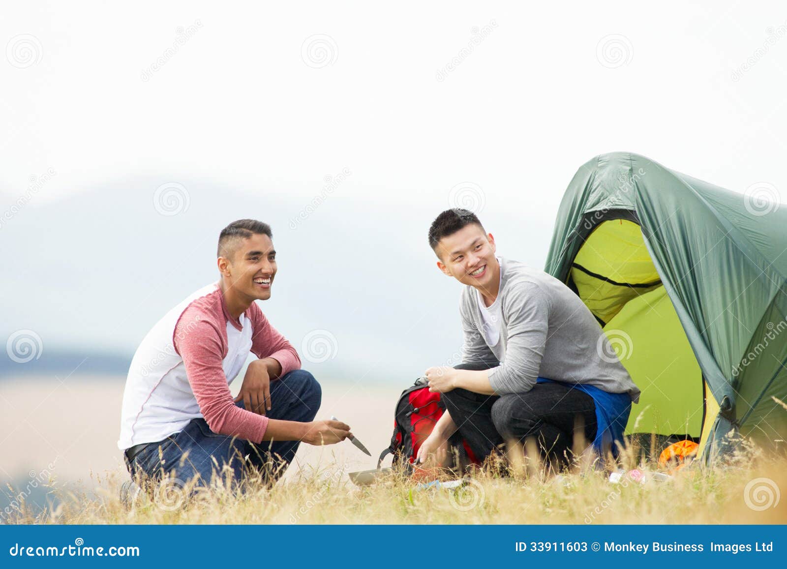 Two Young Men on Camping Trip in Countryside Stock Image Image of