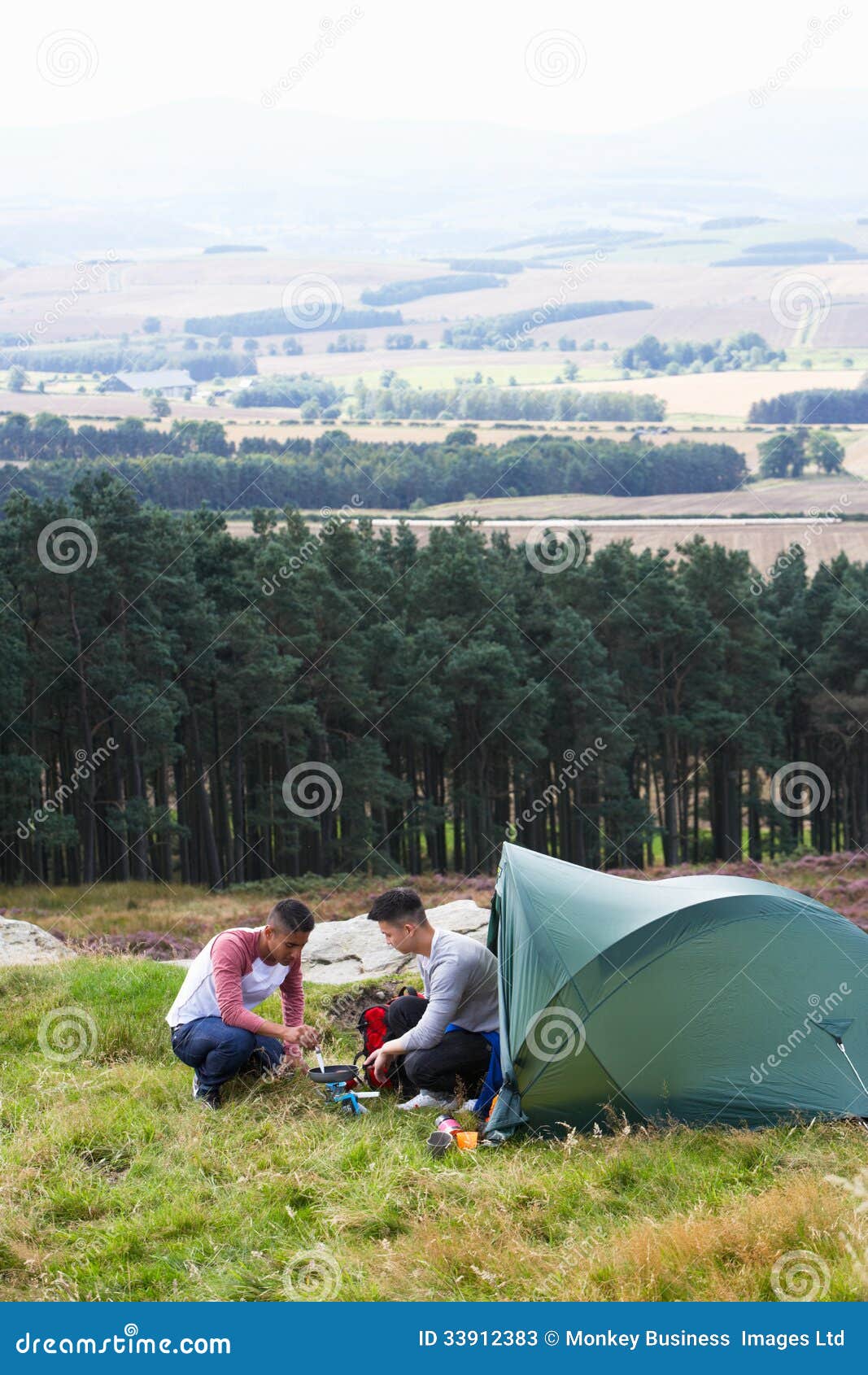 Two Young Men on Camping Trip in Countryside Stock Image Image of
