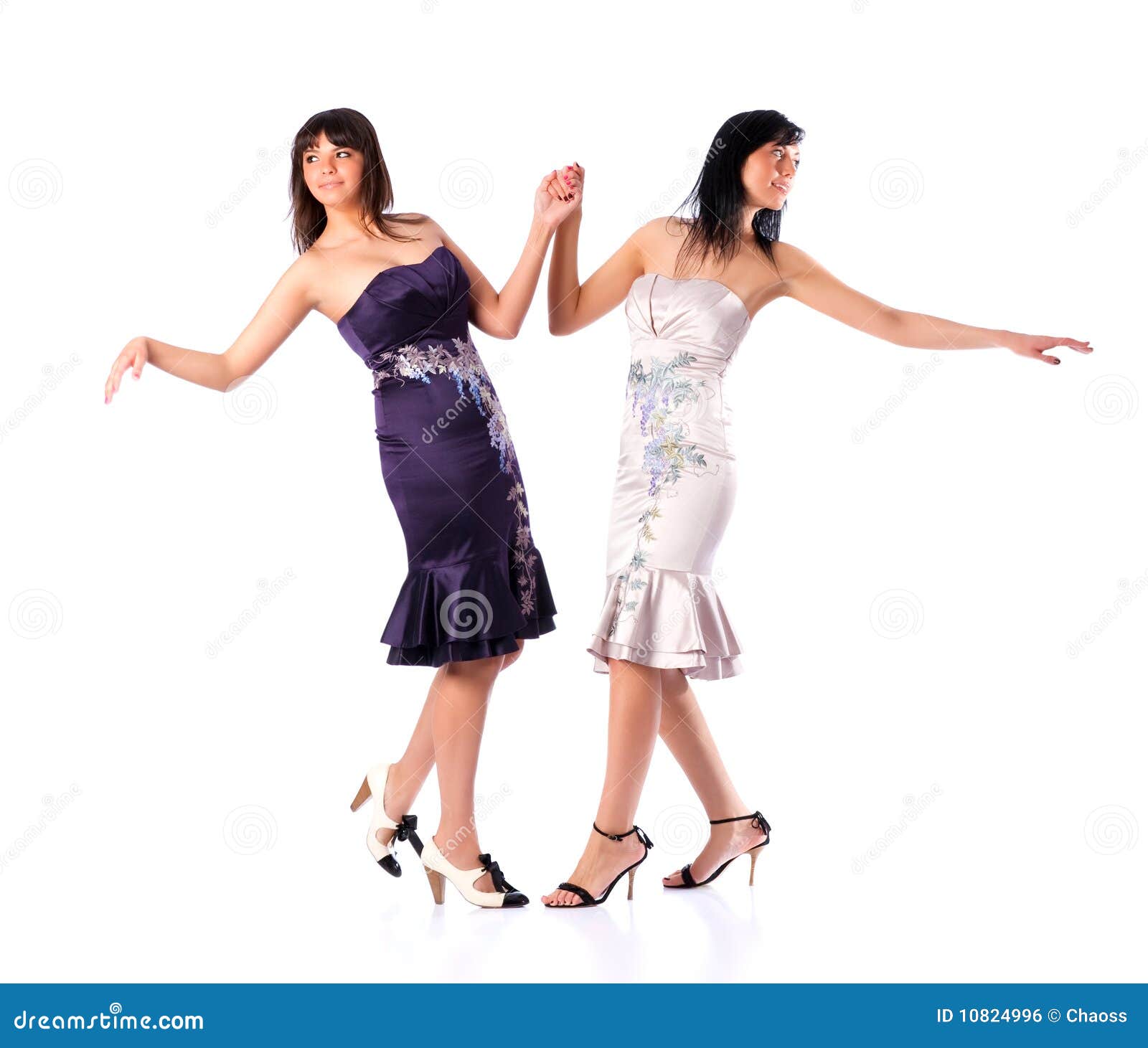 Two young women dancing stock photo. Image of hands, standing 10824996