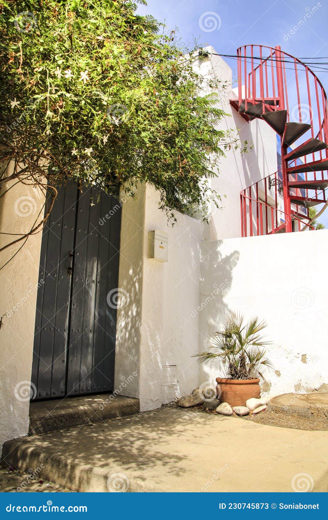 typical andalusian whitewashed facade in almeria, spain