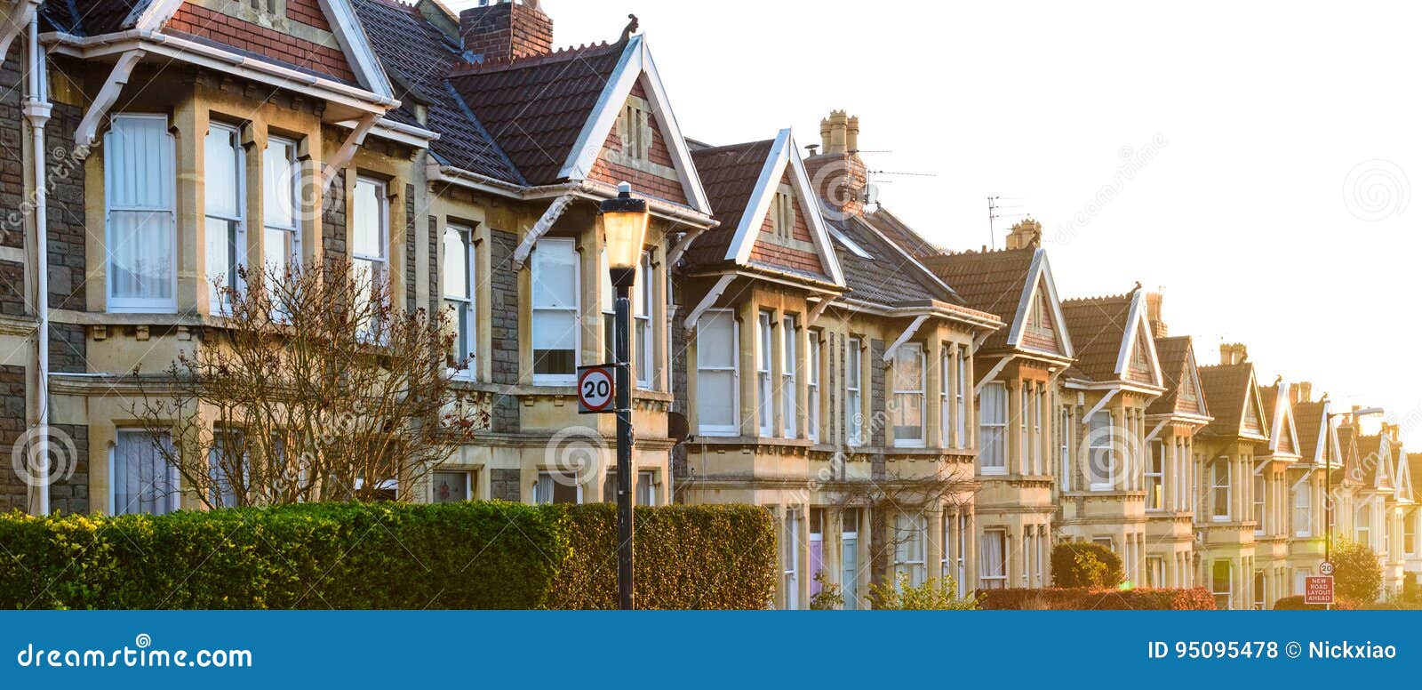 typical english terraced houses in bristol at sunrise