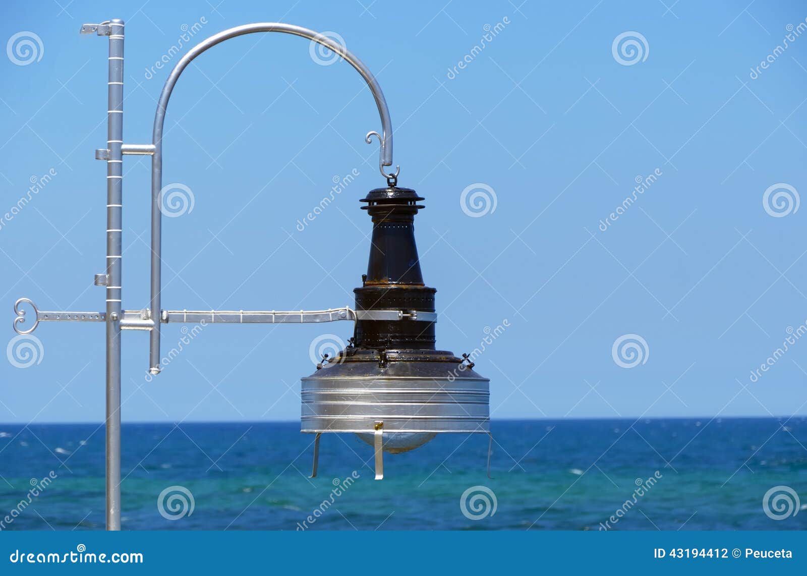 typical lamp used on boats background of the sky