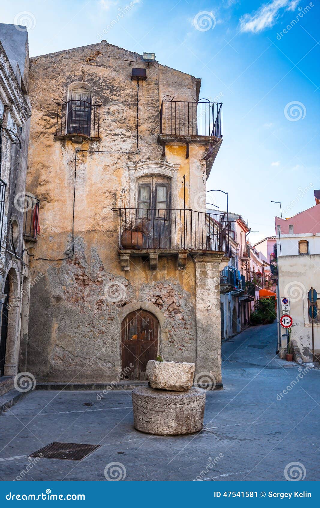 typical narrow street in sicilian village of forza d'agro