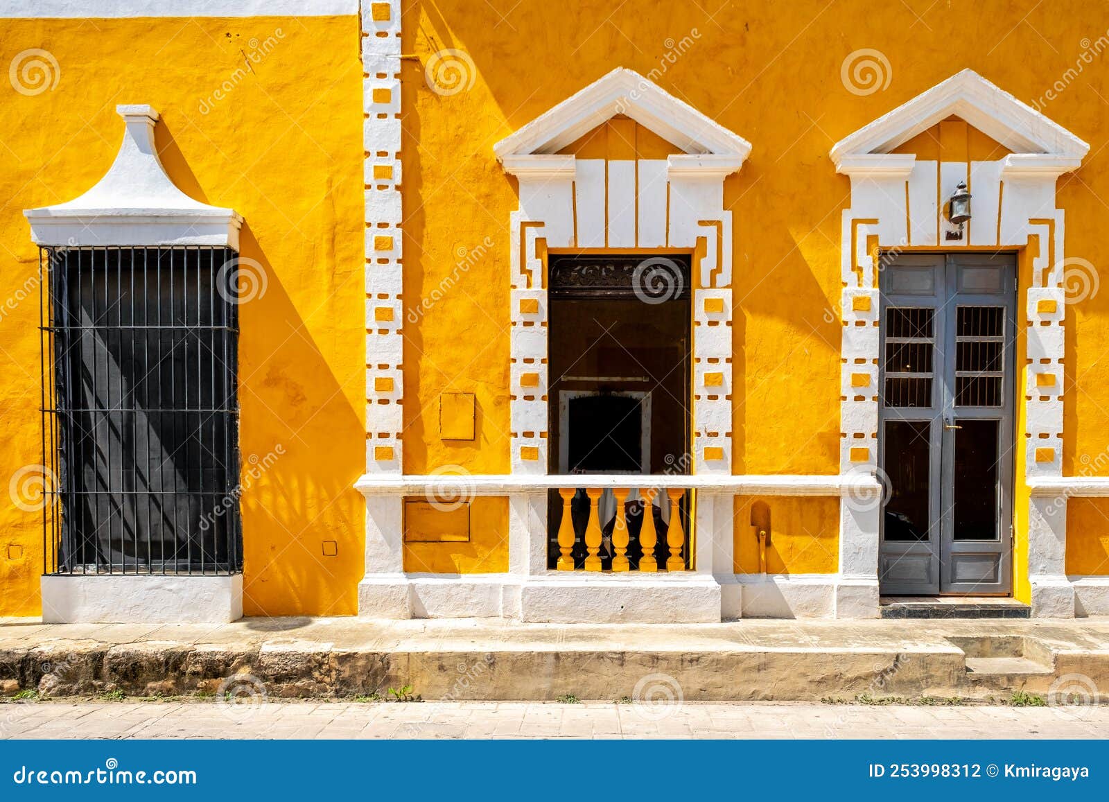 typical old yellow house at the magical town of izamal in yucatan