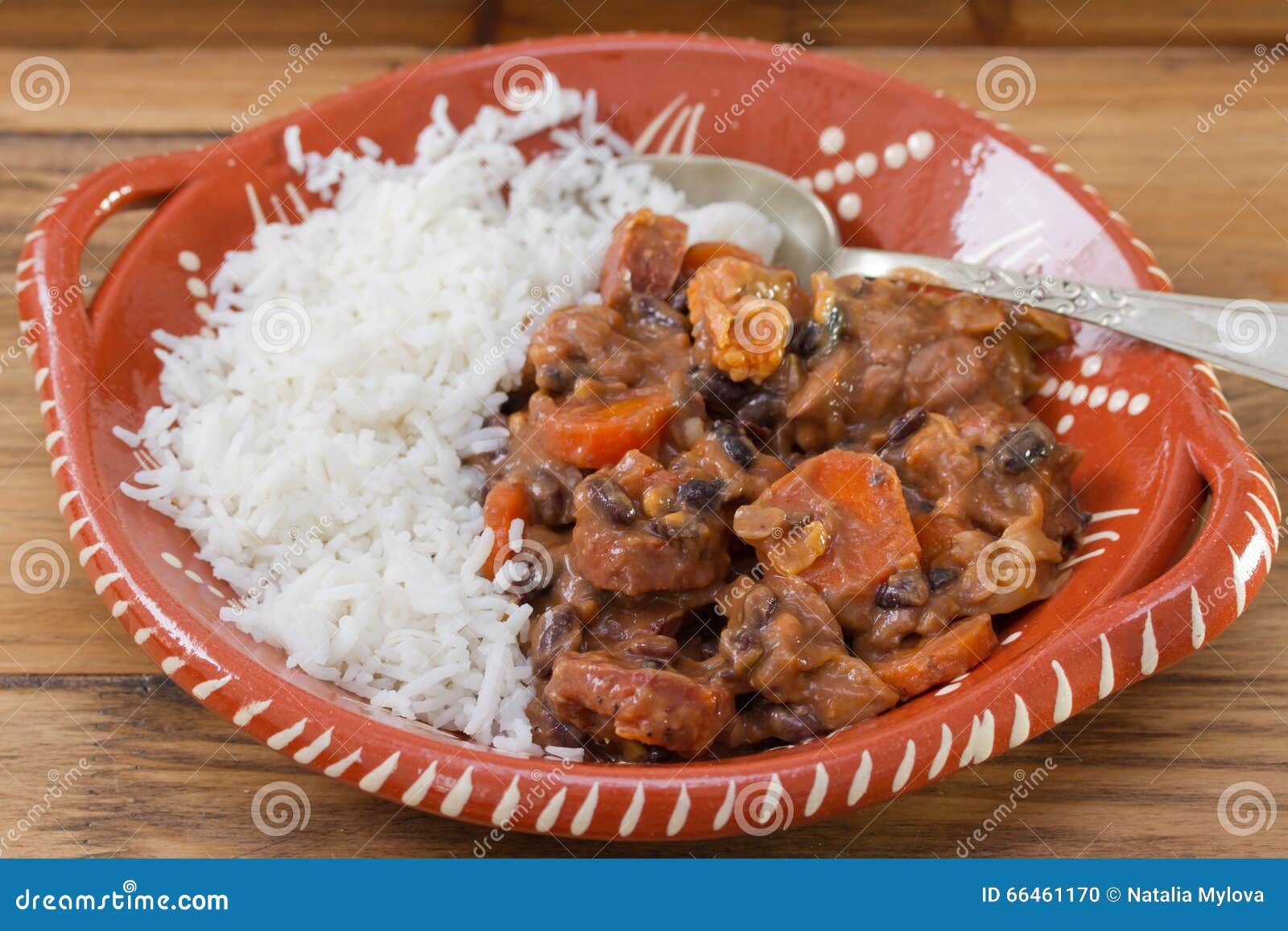 Typical Portuguese Dish Feijoada with Rice in Ceramic Bowl Stock Photo
