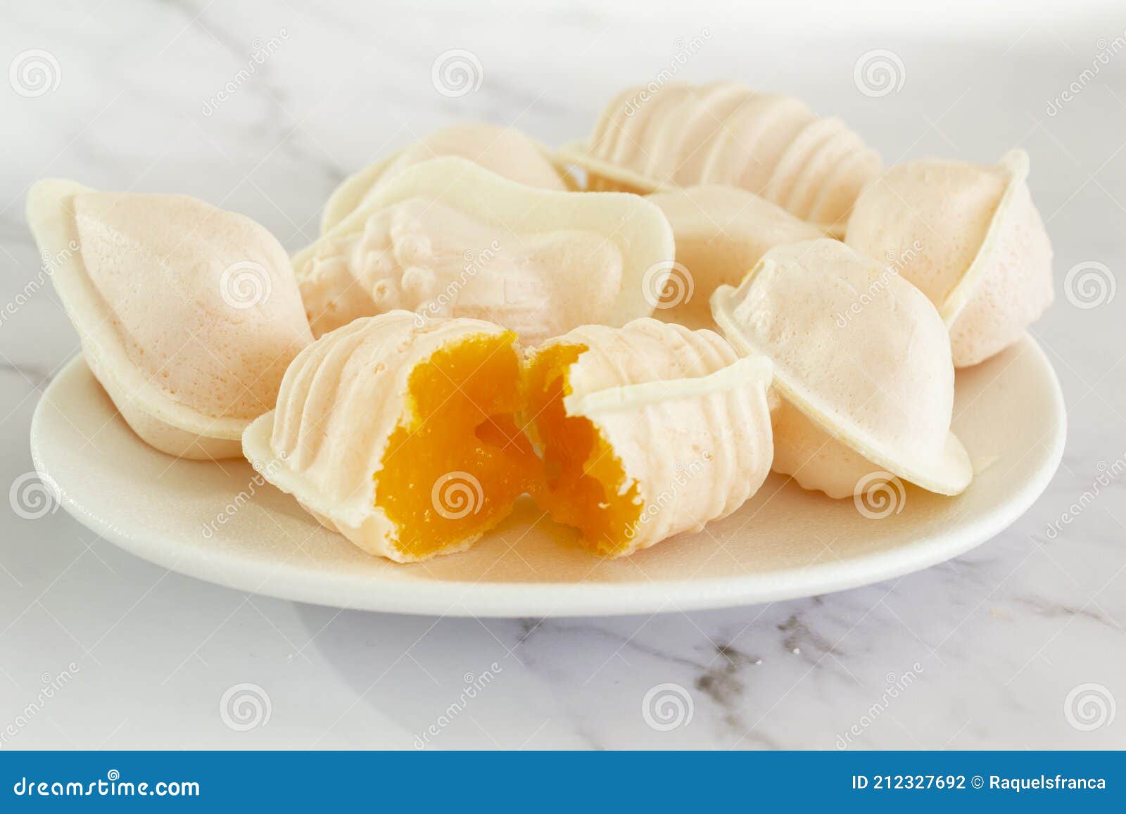typical portuguese egg yolk sweets called ovos moles de aveiro