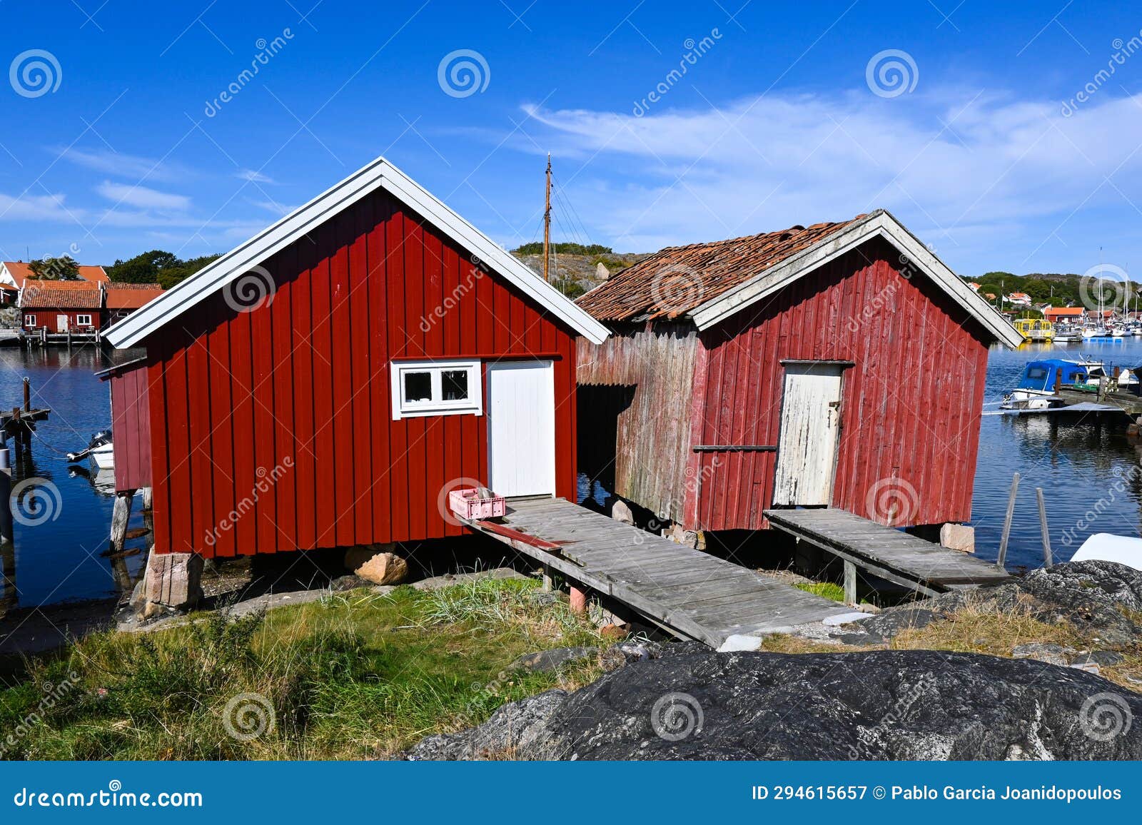 typical scandinavian red huts on the swedish island of koster