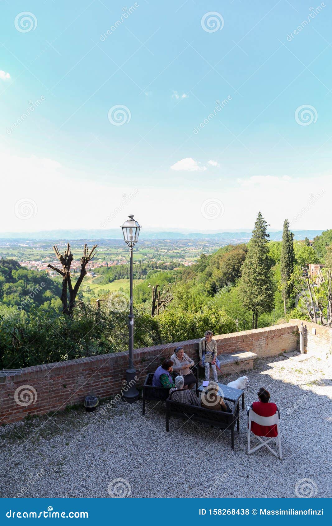 Group of Old People on the Terrace with the Tuscany Valley in the ...