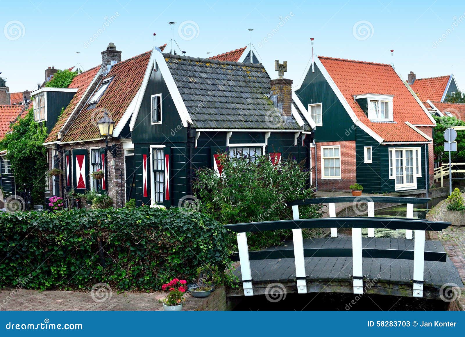 typical small houses and bridge in volendam, holland