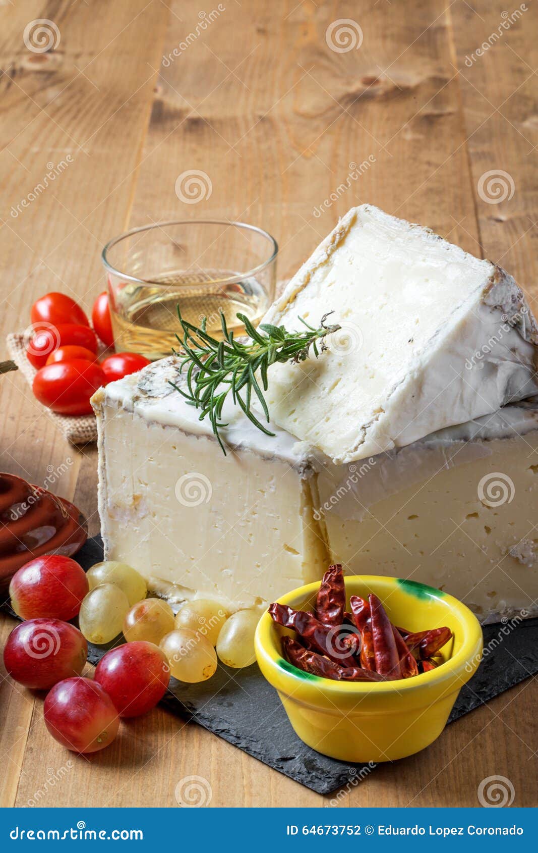 Typical Spanish Cheese with Wine, Grapes and Cherry Tomatoes Stock