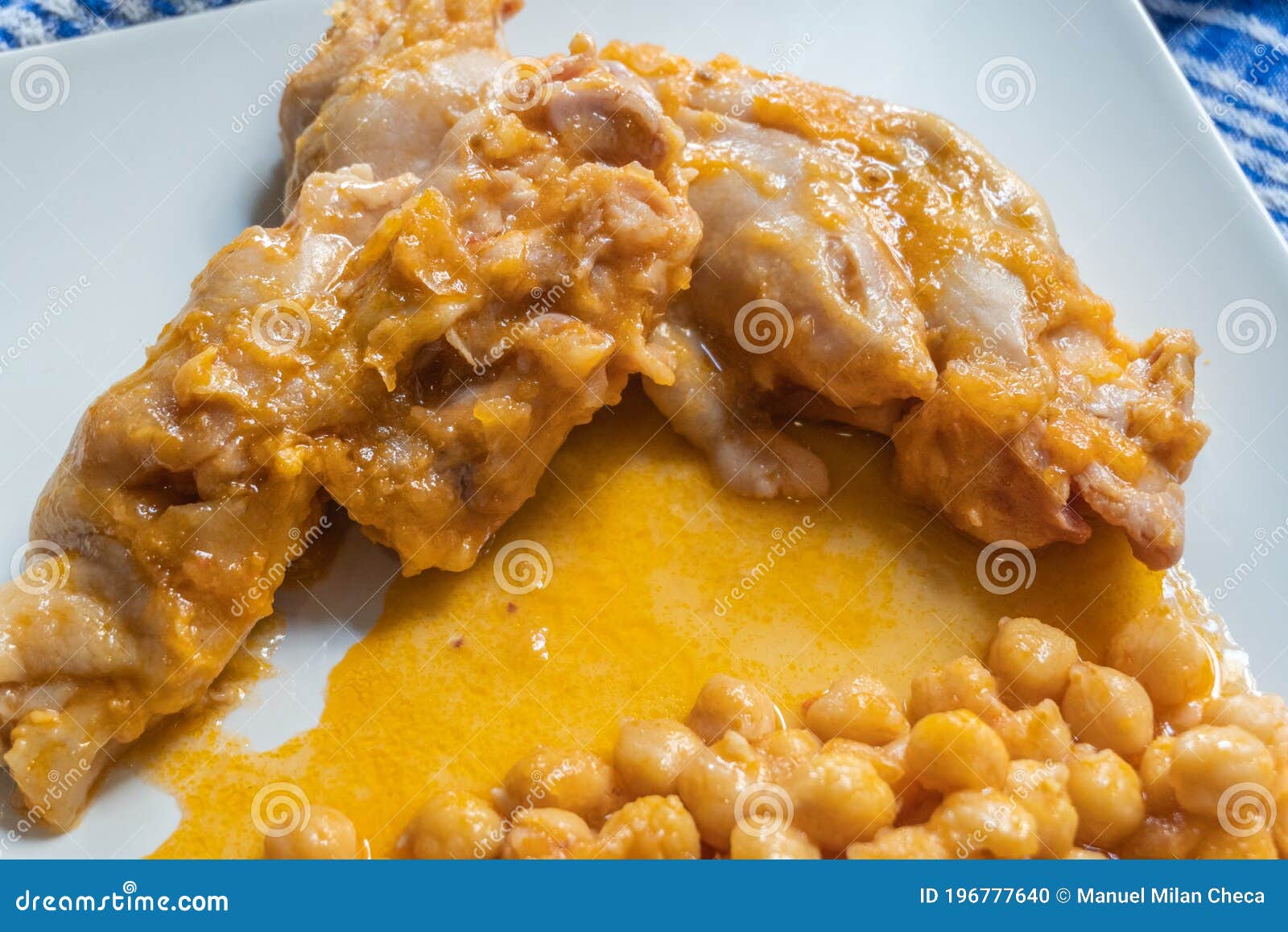 Typical Spanish Dish, Braised Pork Feet with Chickpeas Stock Photo Image of white, chickpea