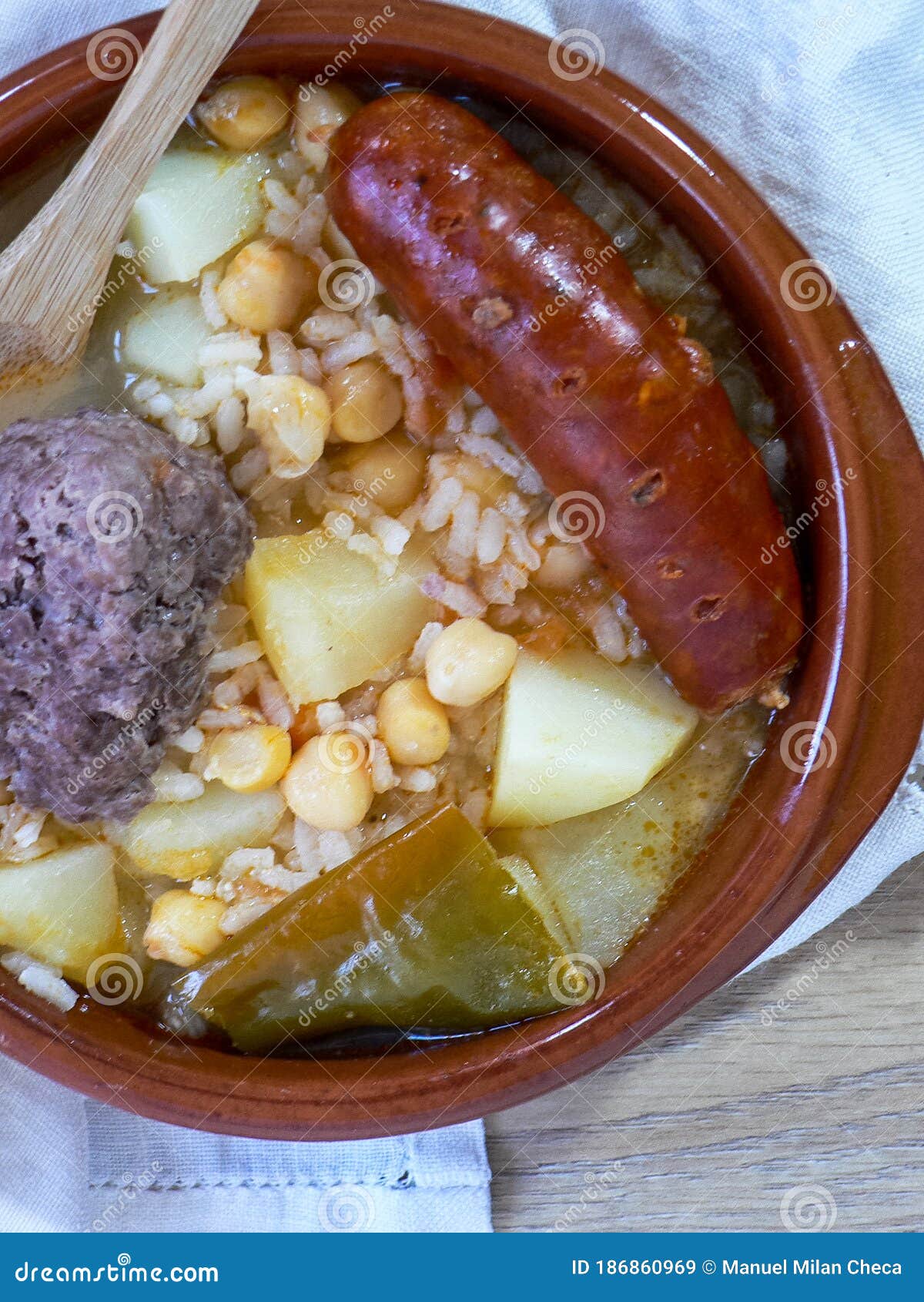 Typical Spanish Stew with Chickpeas, Chorizo, Pepper in Clay Pot Stock
