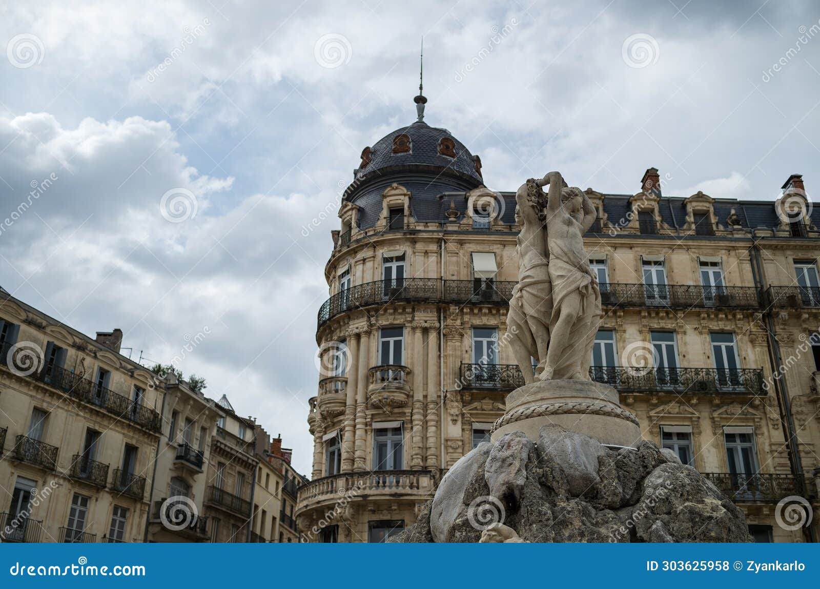 view of the place comedie and the old fountain of the three graces in montpellier in france