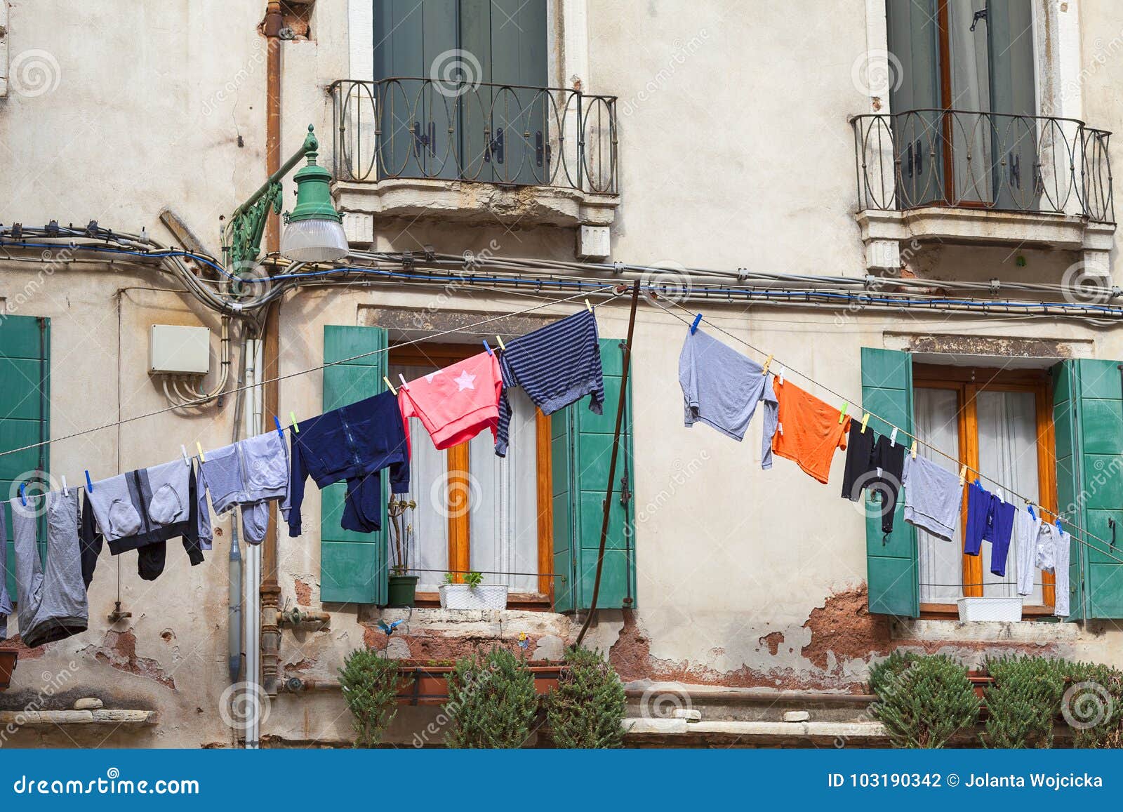 Typical View; the Streets of Venice; Washed Clothes Drying on Cords ...