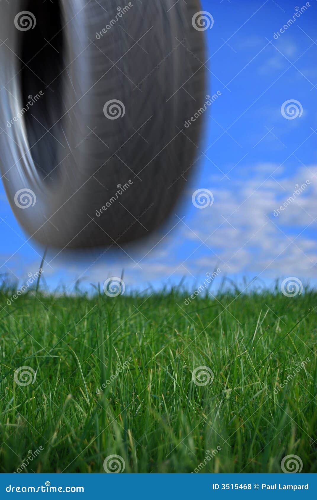 Tyre bouncing down hill stock photo. Image of background 3515468