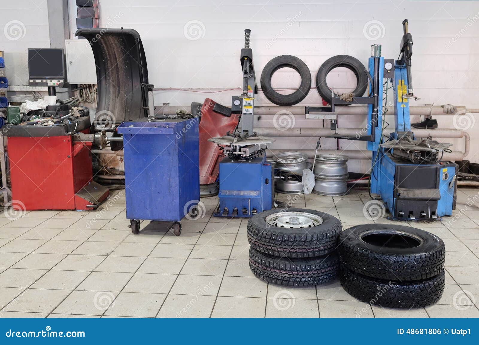 Tyre fitting machine stock photo. Image of motion, station 48681806