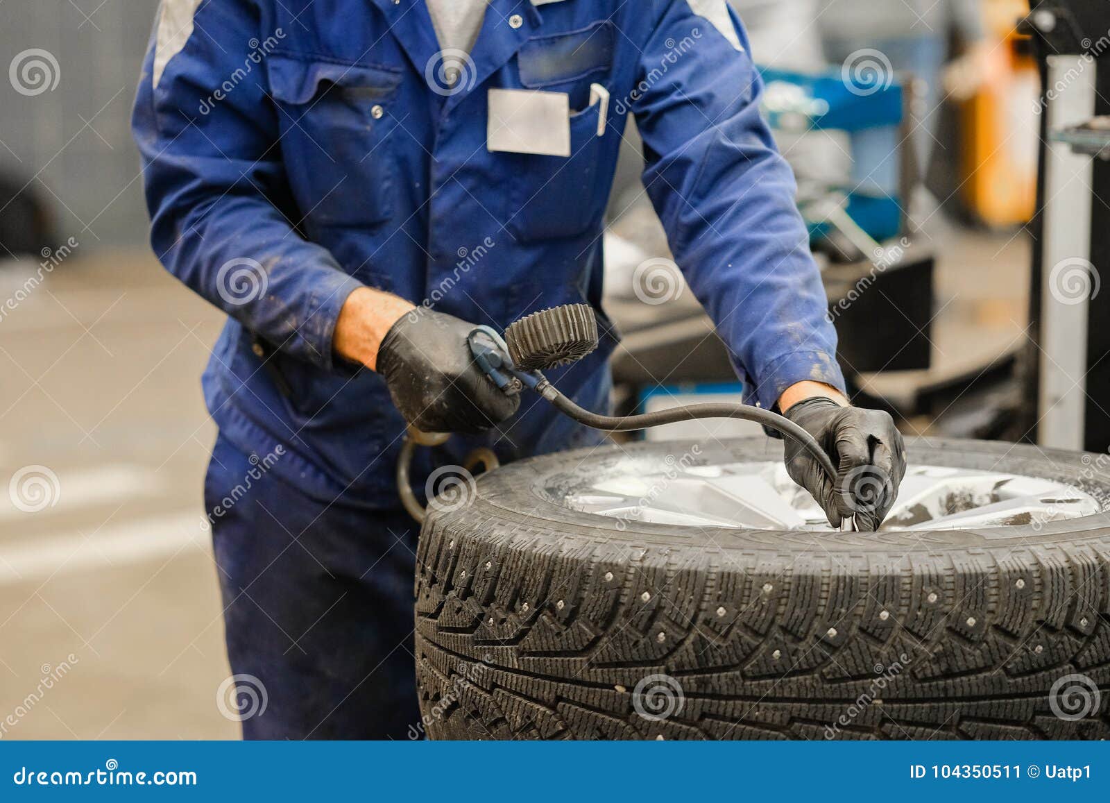 Tyre repair working shop stock image. Image of automobile 104350511