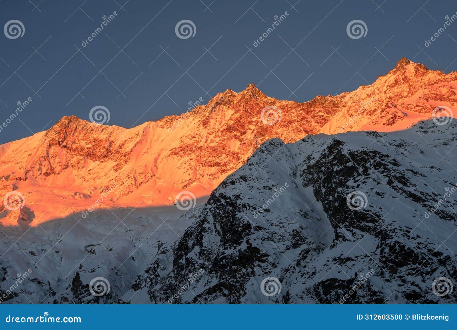 taeschhorn, dom and suedlenz in the mischabel mountain range in the alps at sunrise, saas-fee, switzerland