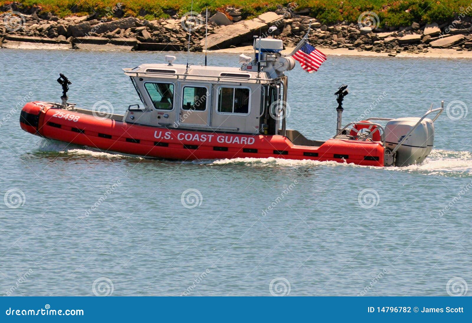 Rigid hull inflatable boat with outboard motor in the shore beaten by the  waves. Used to fish at sea Stock Photo by wirestock