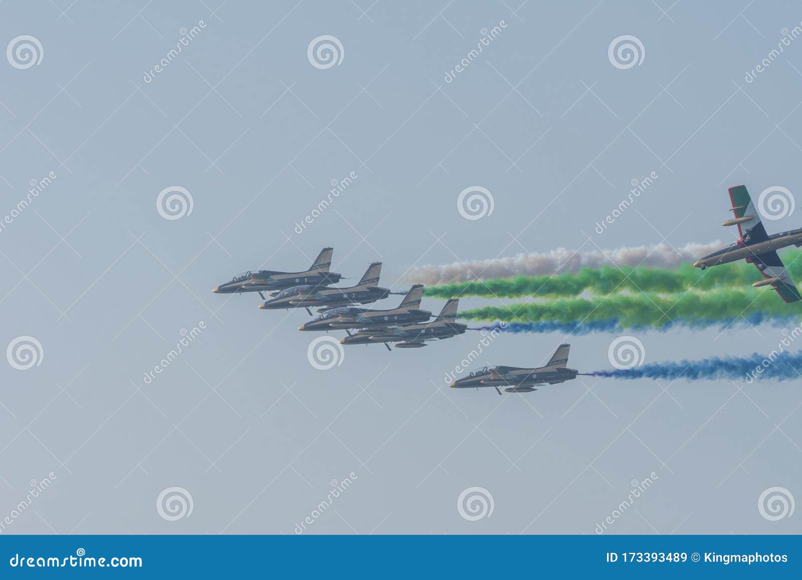 uae largest military union fortress 7 show in umm al quwain with coordinated military aircrafts showing the uae flag colors on the