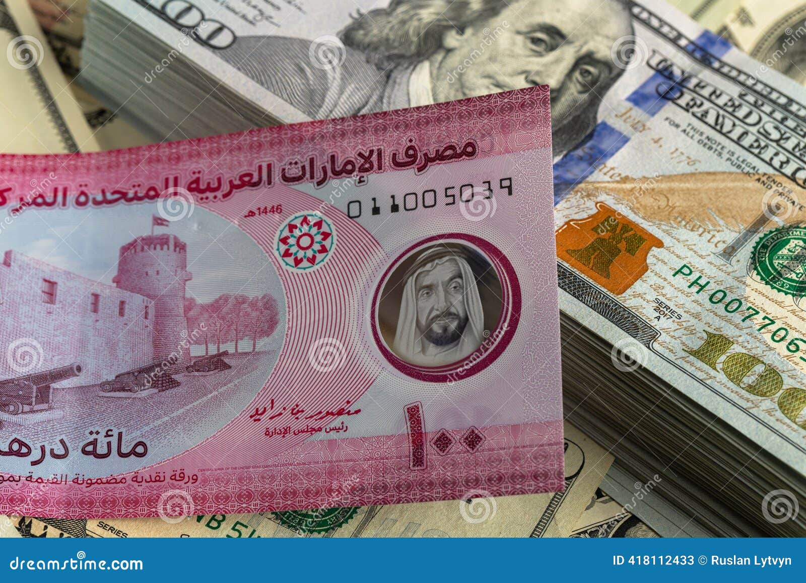 UAE One Hundred Dirham Banknote on Stack of US One Hundred Dollar Bills  Stock Image - Image of angle, high: 418112433
