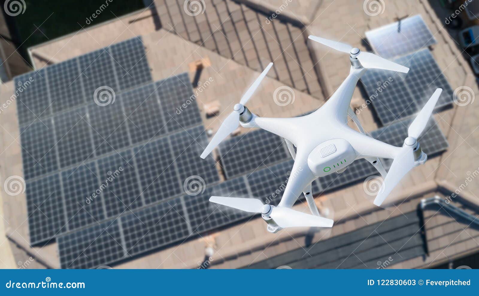 uav drone inspecting solar panels on large house