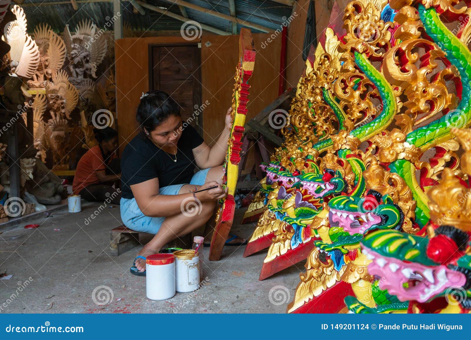 UBUD/INDONESIA-APRIL 27 2019: a Female Craftsman from Ubud is Making