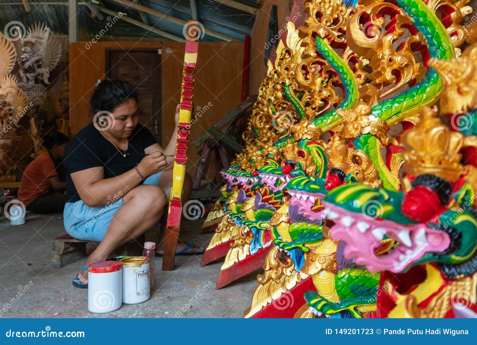 UBUD/INDONESIA-APRIL 27 2019: a Female Craftsman from Ubud is Making