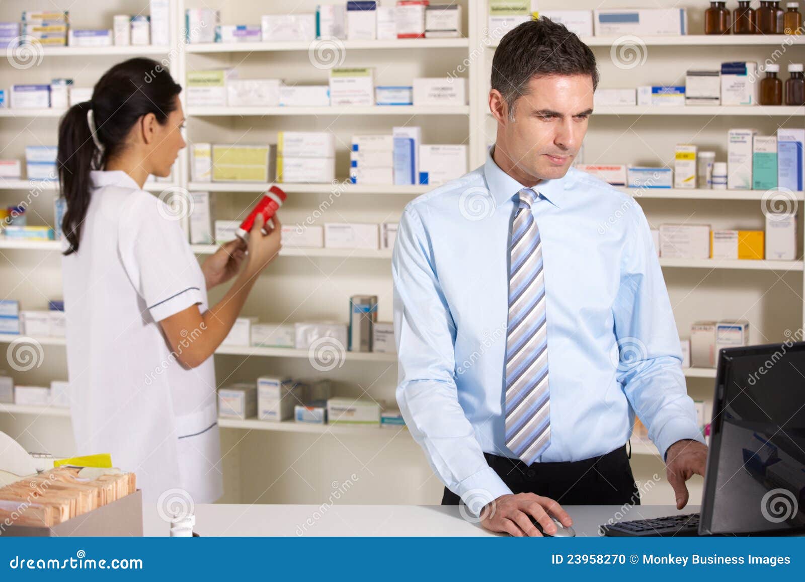 UK Nurse and Pharmacist Working in Pharmacy Stock Photo Image of