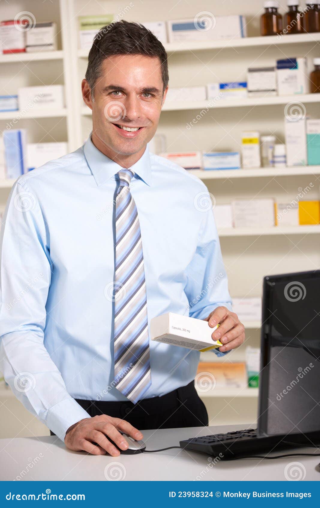 UK pharmacist at work stock photo. Image of indoors, pharmacist 23958324