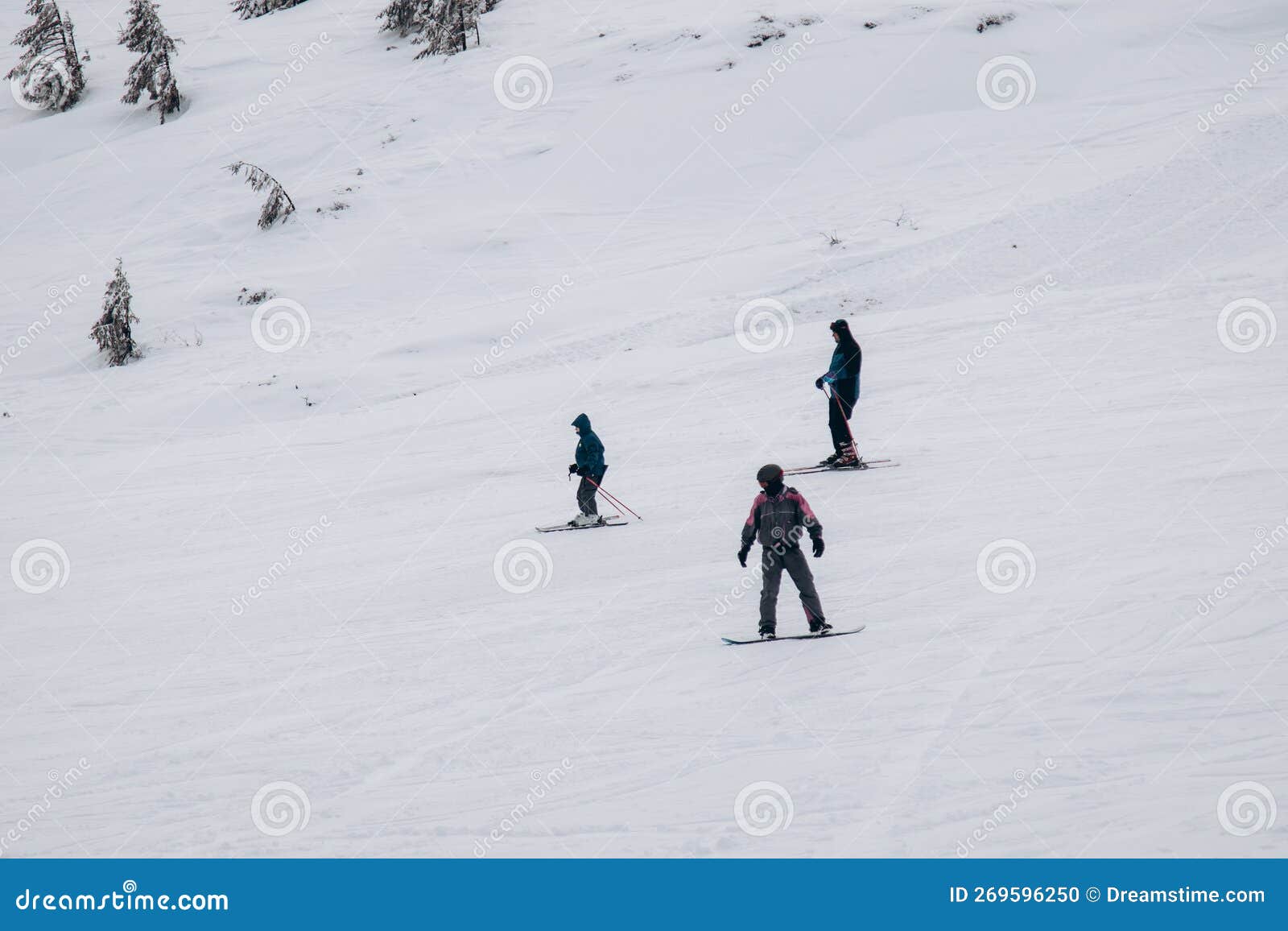 01.12.23 ukraine, dragobrat people go snowboarding and skiing from snowy mountains. snow boarding in winter.