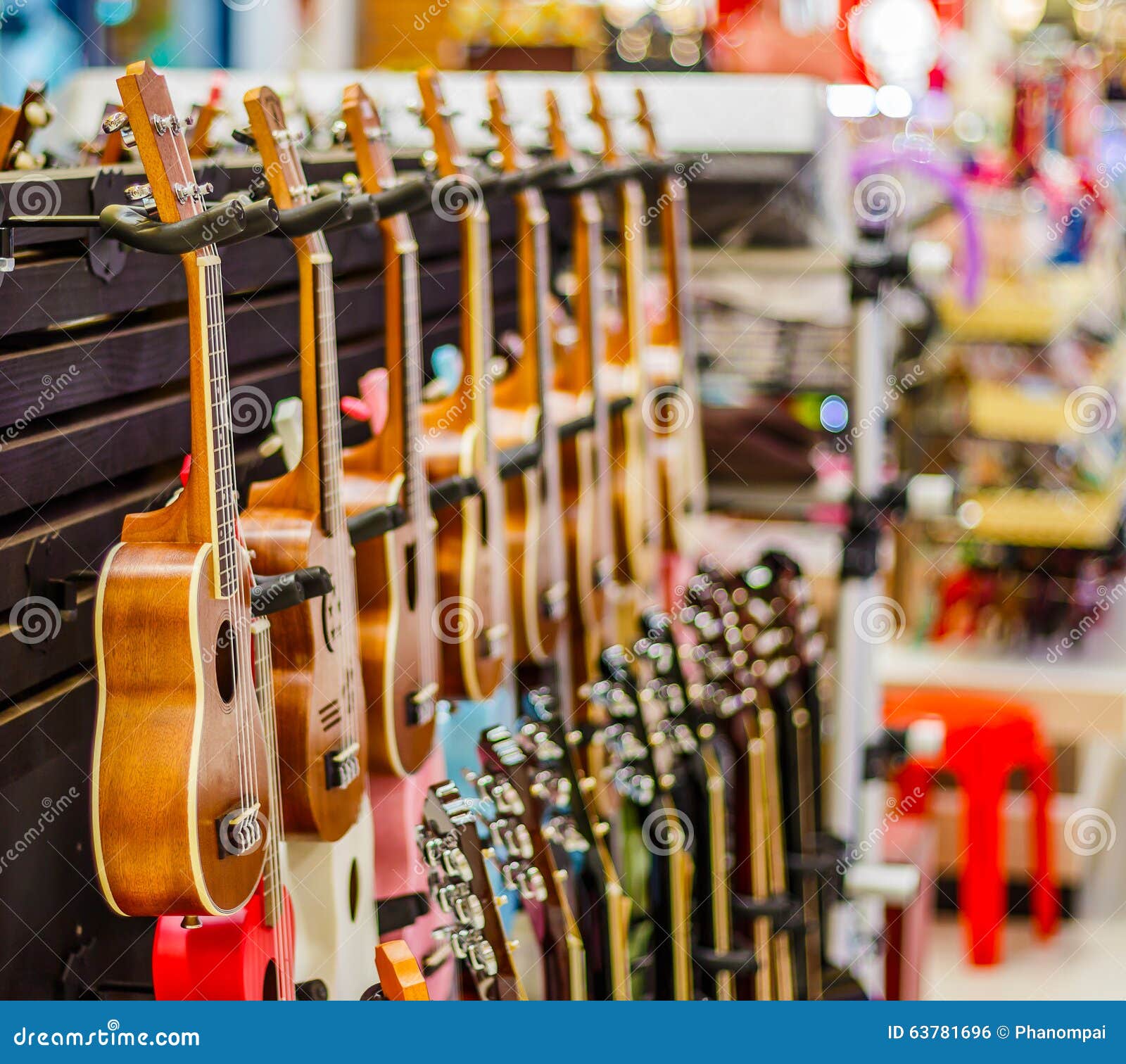 Ukulele Guitar on Row for Sell Stock Photo Image of instrument