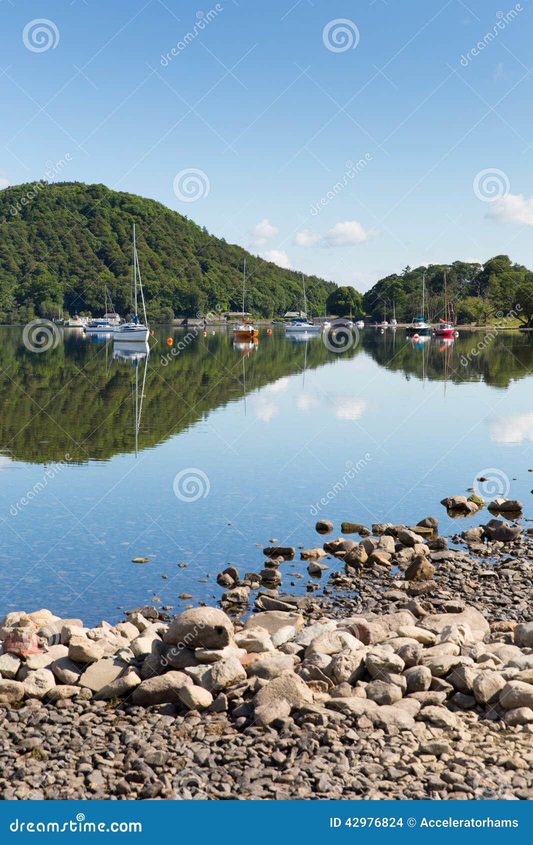 ullswater by pooley bridge lake district cumbria boats blue sky and sunshine