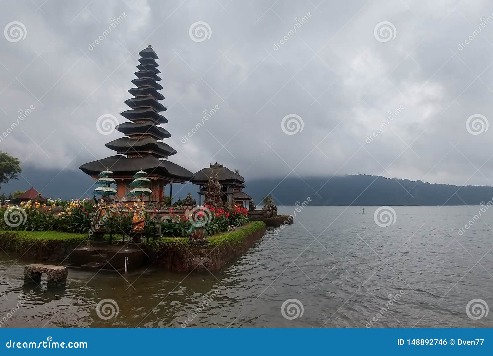 Ulun Danu Temple Beratan Lake In Bali Indonesia An Mountain In Fog