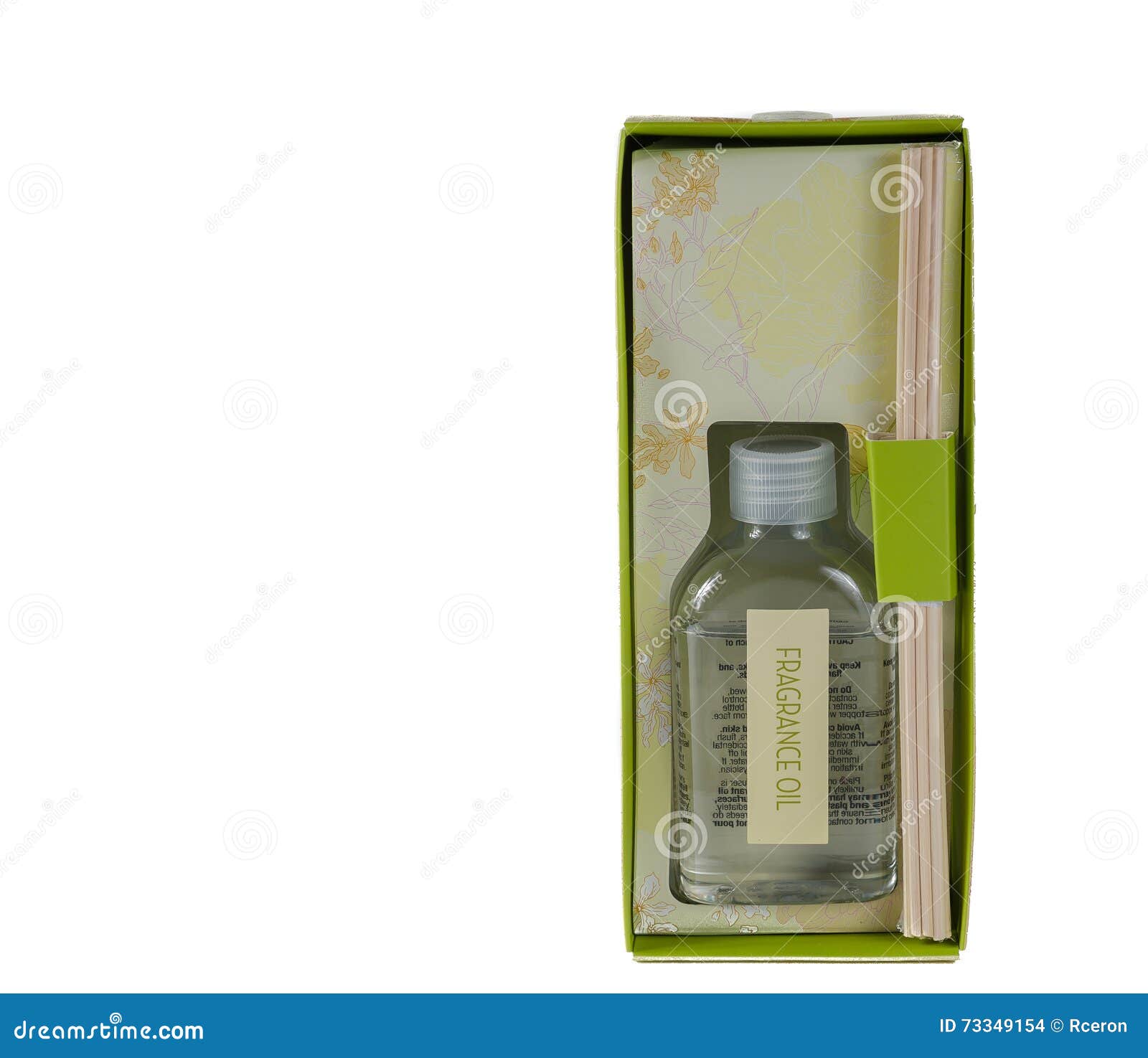 Um perfume do óleo da fragrância em um presente da caixa. Um presente do óleo da fragrância isolado no backgroundn branco